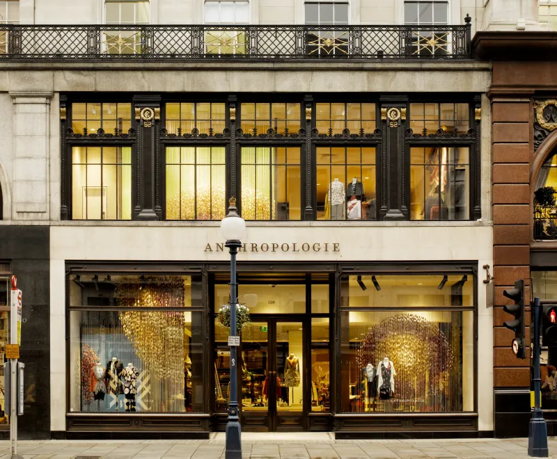 Anthropologie on Regent Street, London: the shopfront and the lit windows above it, in the old building